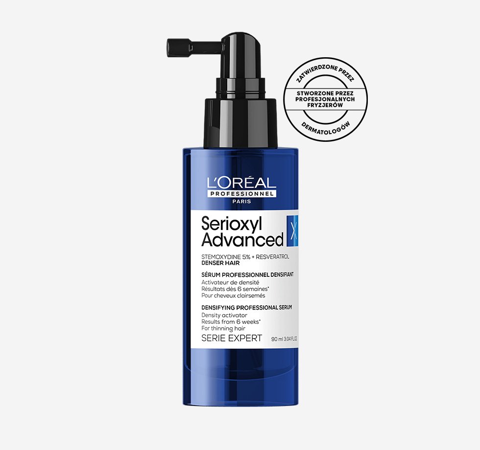 Niebieski serum do włosów L’Oréal Professionnel z pompką, na białym tle.