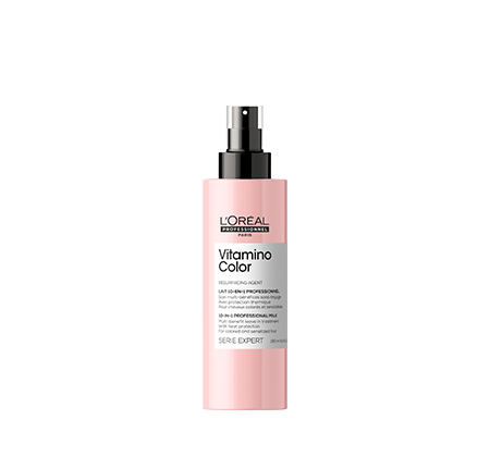 Różowy spray L’Oréal Professionnel Vitamino Color stoi na czarnym tle.
