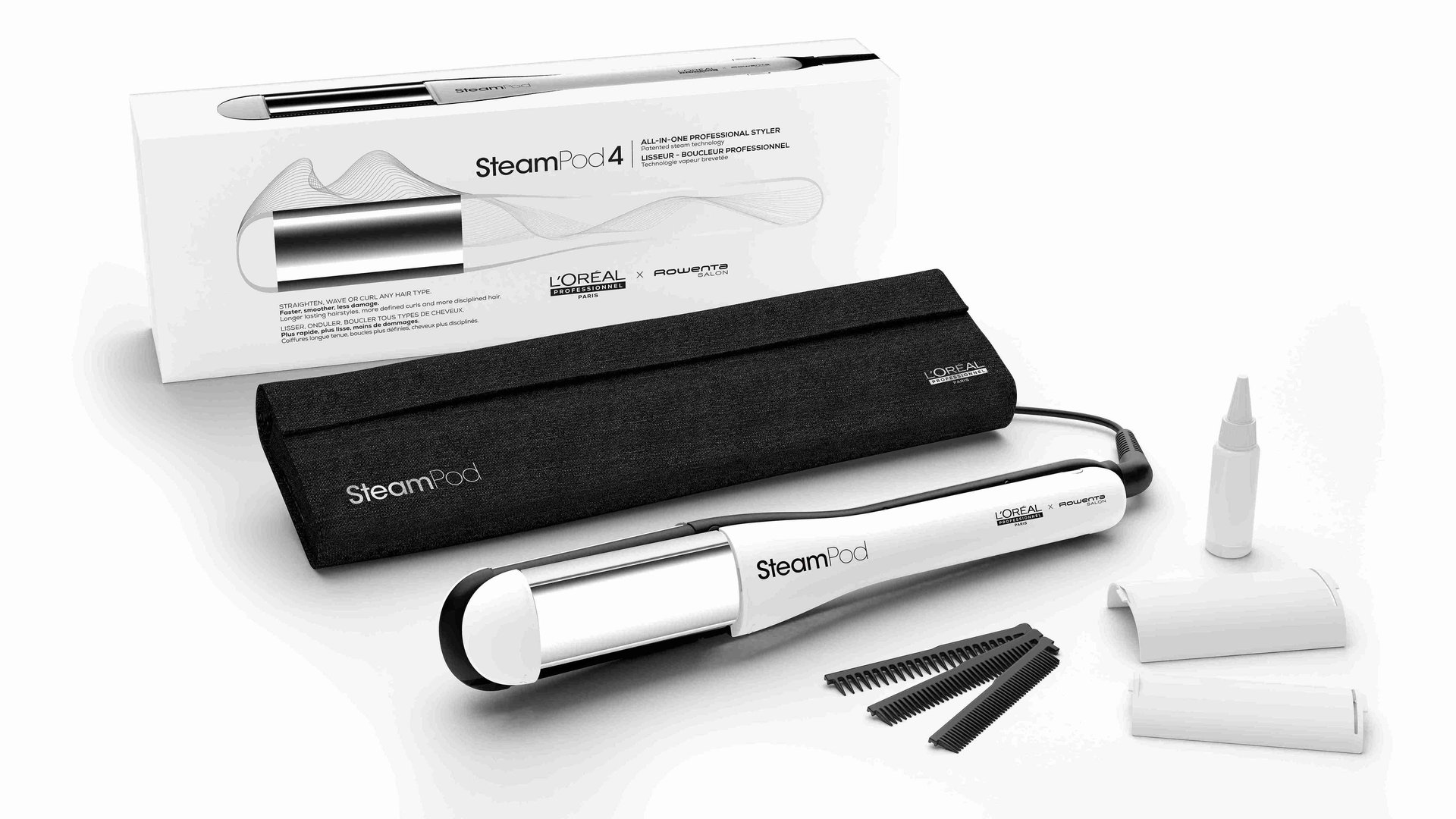 Prostownica SteamPod 4 z akcesoriami, ułożona obok etui i pudełka na białym tle.