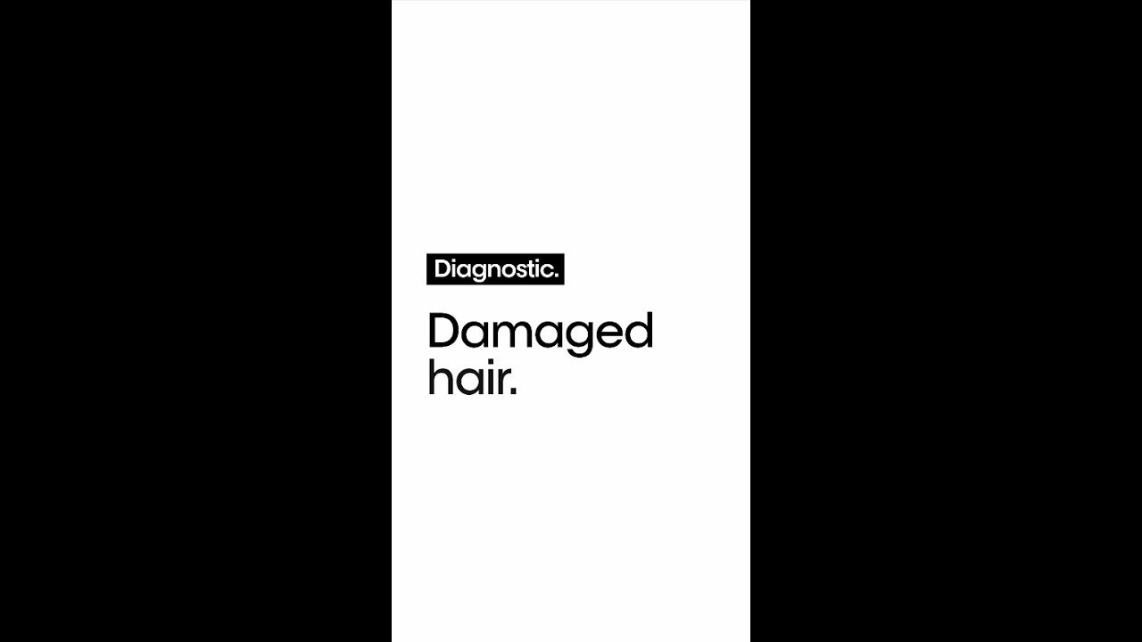 Ekran diagnostyczny z napisem „Damaged hair” na białym tle.
